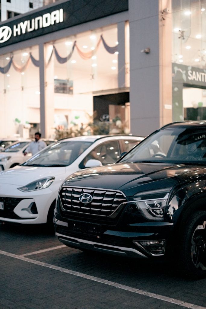 New Hyundai SUVs parked outside a dealership in Kolhapur, India.